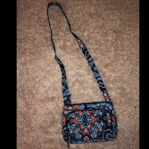 A blue and orange Vera Bradley purse.